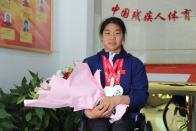 轮椅上的“追风者” 