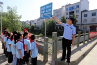 麻家渡镇柿树坪小学：“警”防溺水 安全一夏