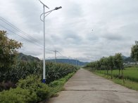 擂鼓镇：路灯修建暖民心 齐心协力建家园