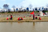 麻家渡镇初级中学：护河净滩 追“锋”而行