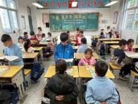 擂鼓镇小学：书香润校园，共读伴成长