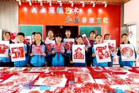 柿树坪小学：巧手剪纸 献礼“五一”