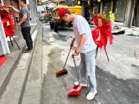 县移民服务中心做好桃花源开街志愿服务活动